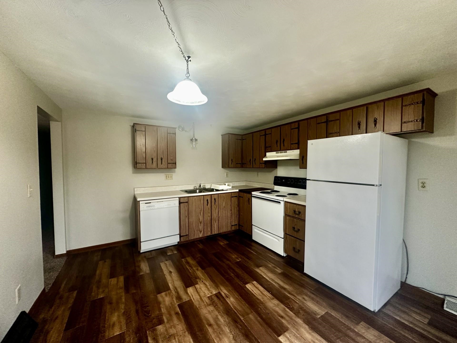 550 Hanabarger Street Lanark, IL 61046 - Photo 7 of 21 a kitchen with stainless steel appliances a refrigerator sink and microwave