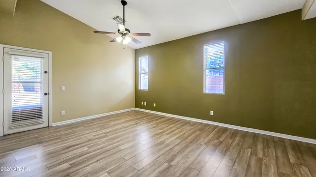 a view of a hallway with staircase