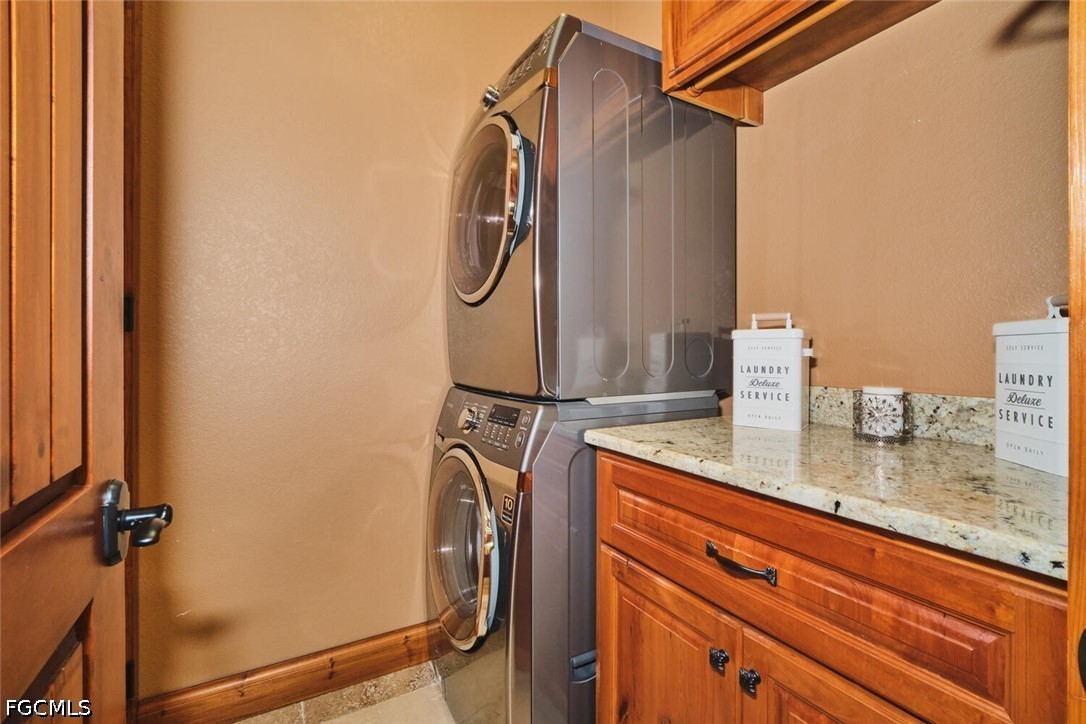5306 Southwest 27th Place Cape Coral, FL 33914 - Photo 14 of 50 a bathroom with a granite countertop sink and a mirror