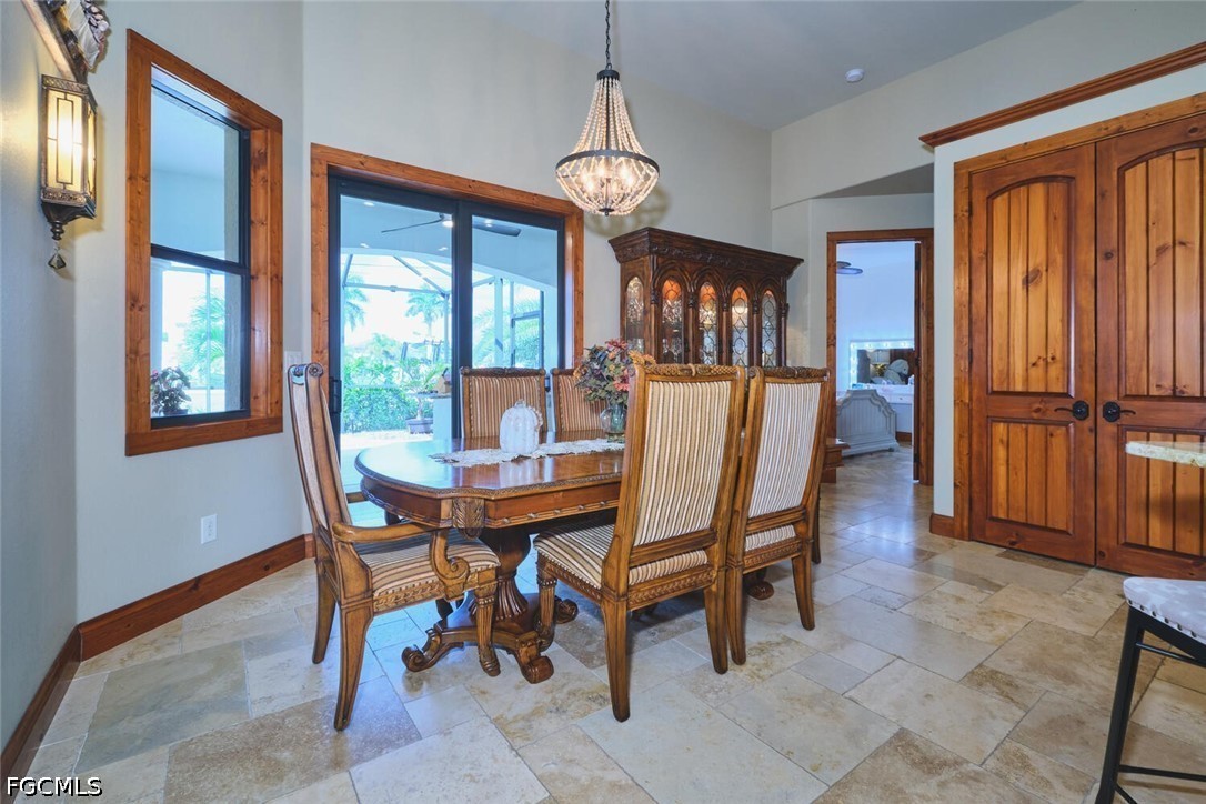 5306 Southwest 27th Place Cape Coral, FL 33914 - Photo 15 of 50 a view of a dining room with furniture and window