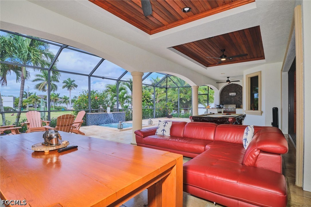5306 Southwest 27th Place Cape Coral, FL 33914 - Photo 30 of 50 a view of a patio with a table chairs and a patio