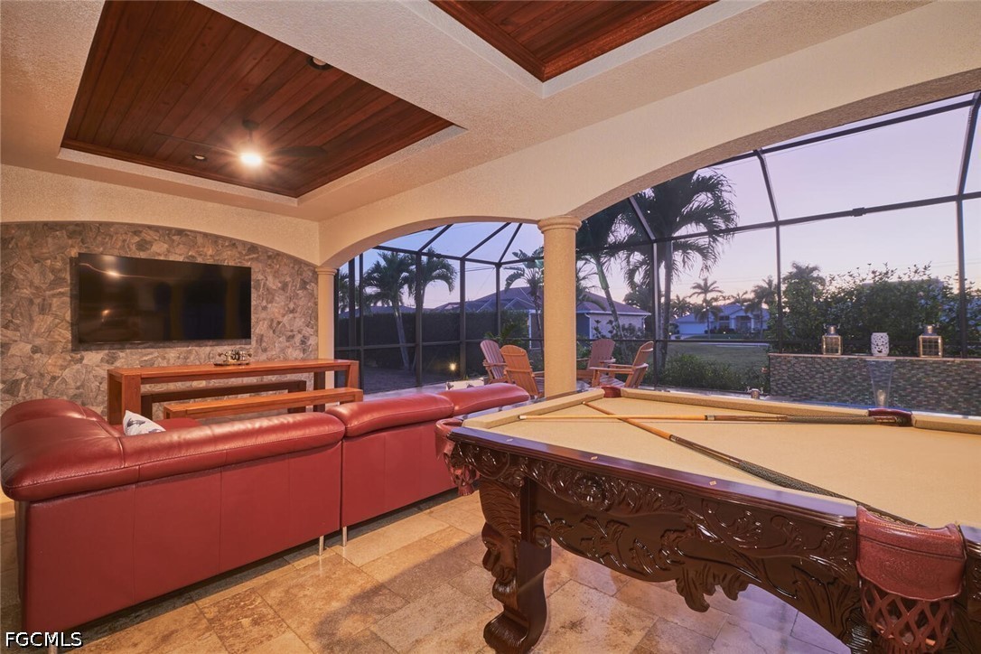 5306 Southwest 27th Place Cape Coral, FL 33914 - Photo 33 of 50 a room with furniture and flat screen tv