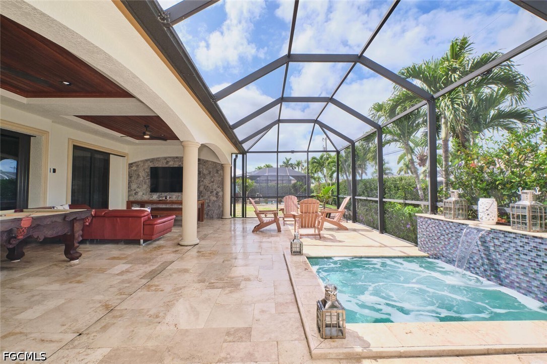 5306 Southwest 27th Place Cape Coral, FL 33914 - Photo 35 of 50 a view of a swimming pool with a patio
