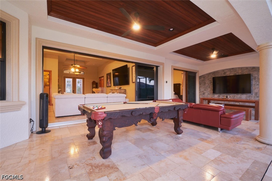 5306 Southwest 27th Place Cape Coral, FL 33914 - Photo 37 of 50 a living room with furniture and a flat screen tv