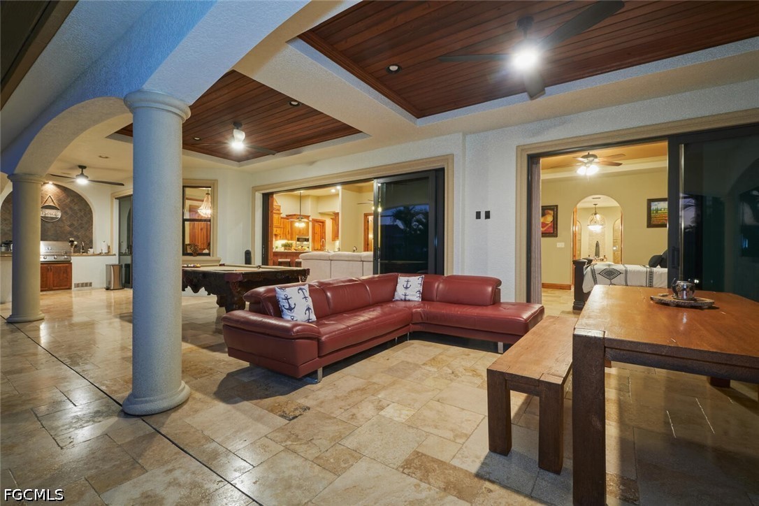 5306 Southwest 27th Place Cape Coral, FL 33914 - Photo 39 of 50 a living room with furniture and a large window