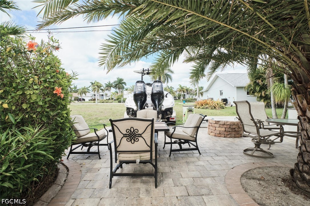 5306 Southwest 27th Place Cape Coral, FL 33914 - Photo 45 of 50 a view of a backyard with sitting area