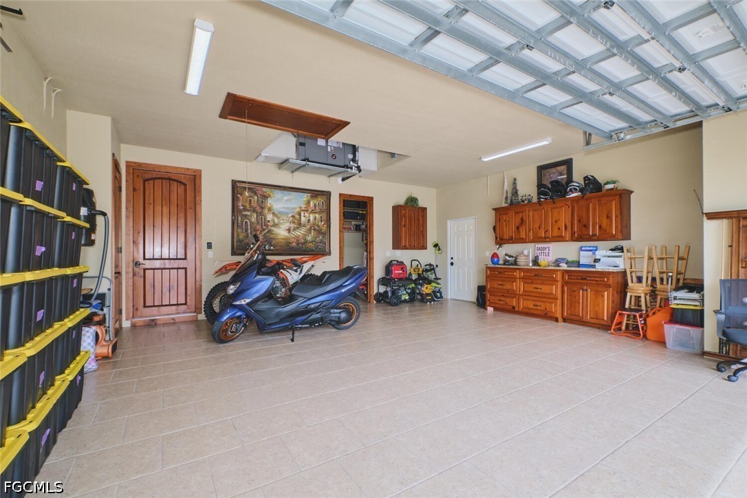 5306 Southwest 27th Place Cape Coral, FL 33914 - Photo 47 of 50 a view of car in garage