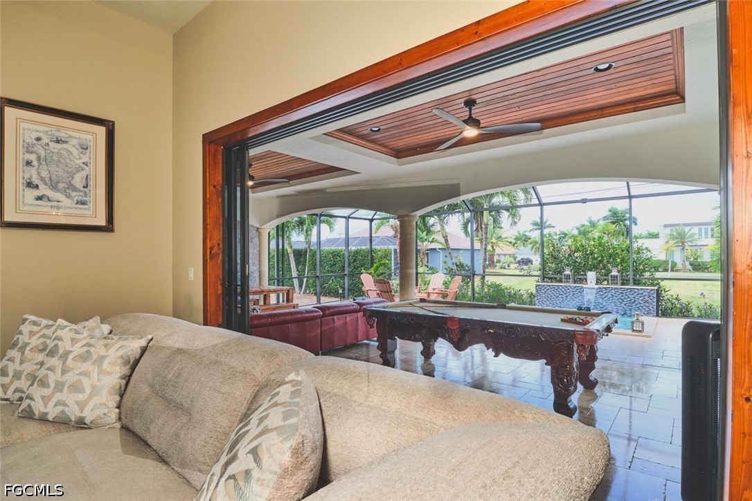 5306 Southwest 27th Place Cape Coral, FL 33914 - Photo 6 of 50 a bed sitting in a bedroom next to a window
