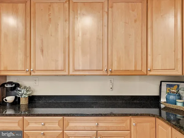 a view of a balcony with wooden floor