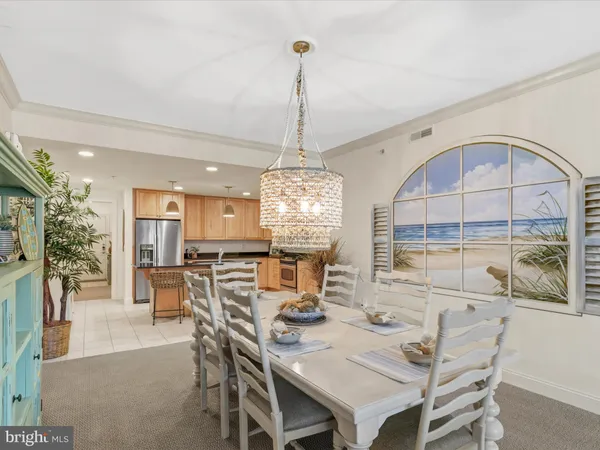 a view of residential house with outdoor space and lake view