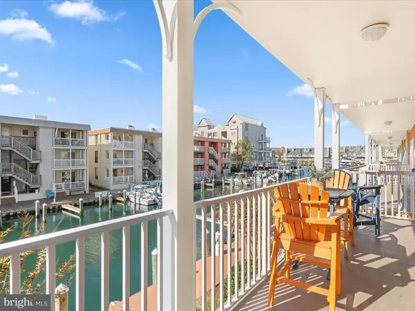 a bathroom with a tub shower and sink