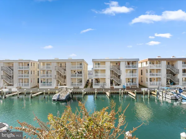a view of a lake with building in front of it