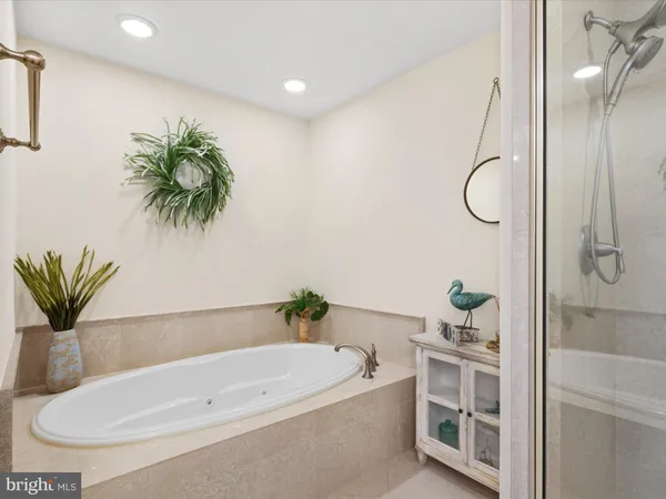 a bedroom with a bed and chair