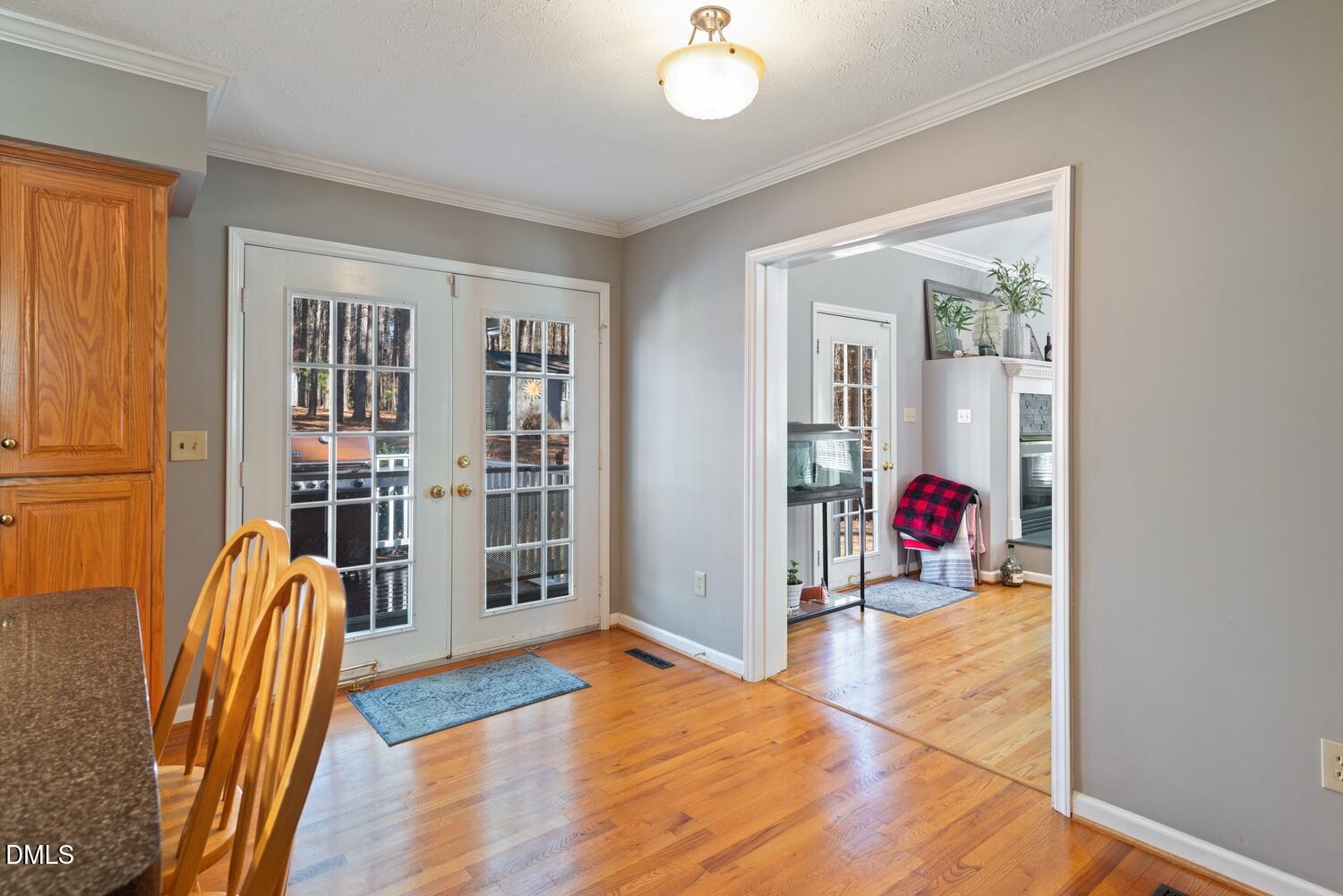 1832 Jimmie Kerr Road Haw River, NC 27258 - Photo 13 of 39 a view of livingroom with furniture and wooden floor