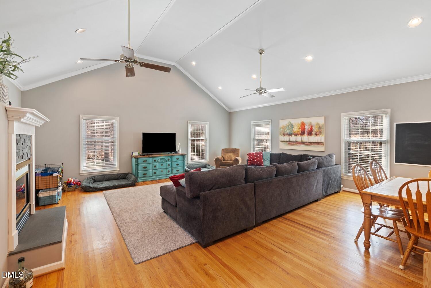 1832 Jimmie Kerr Road Haw River, NC 27258 - Photo 15 of 39 a living room with furniture and a flat screen tv
