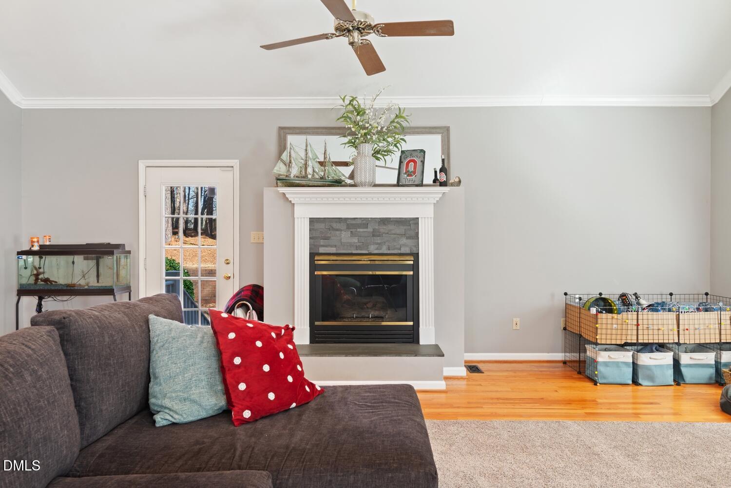 1832 Jimmie Kerr Road Haw River, NC 27258 - Photo 17 of 39 a living room with furniture fireplace and window