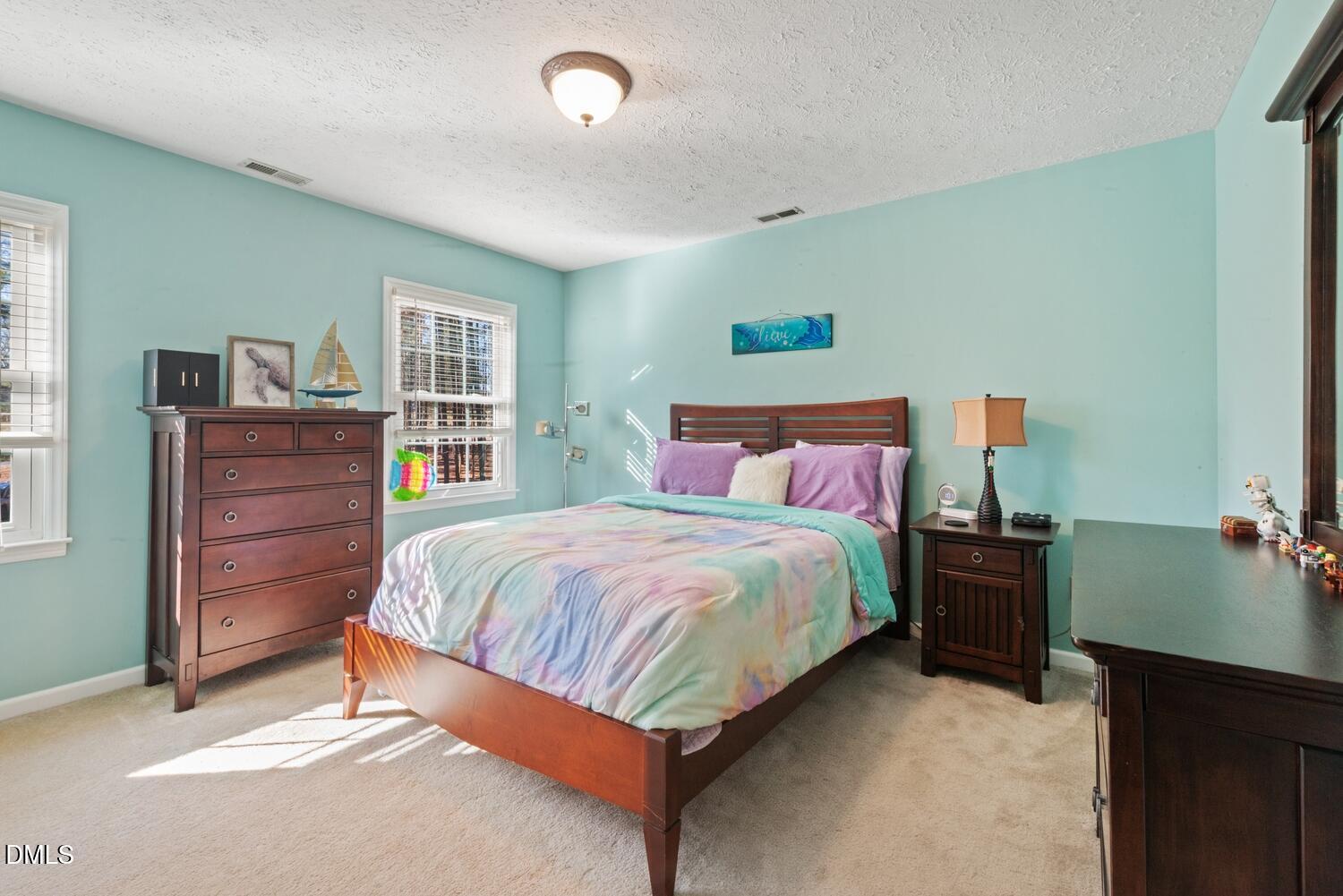 1832 Jimmie Kerr Road Haw River, NC 27258 - Photo 25 of 39 a bedroom with a bed and window