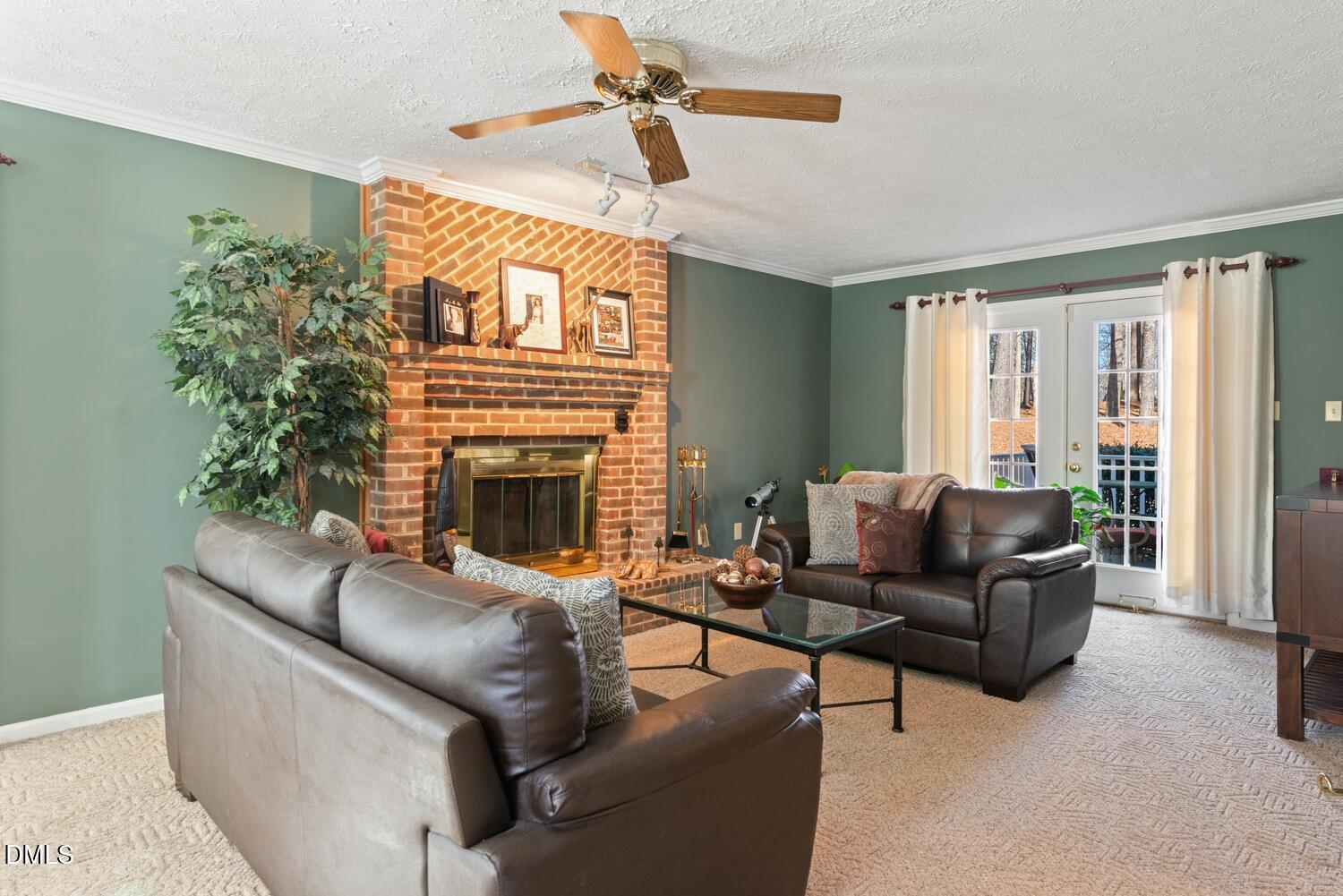 1832 Jimmie Kerr Road Haw River, NC 27258 - Photo 5 of 39 a living room with furniture and a fireplace