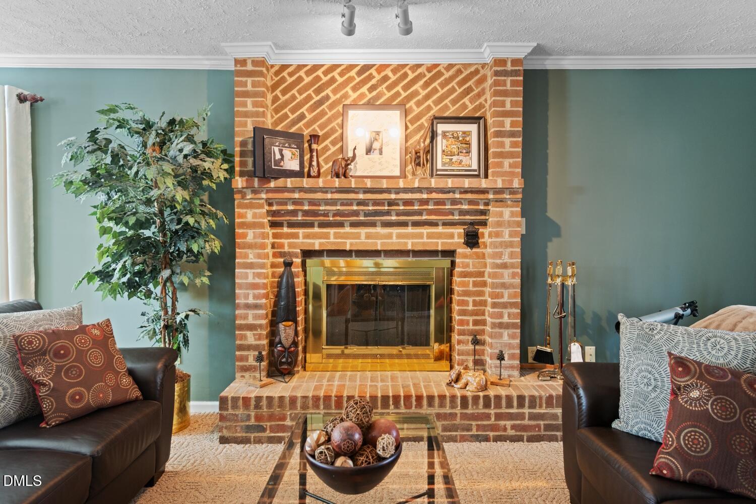 1832 Jimmie Kerr Road Haw River, NC 27258 - Photo 6 of 39 a living room with furniture and a fireplace