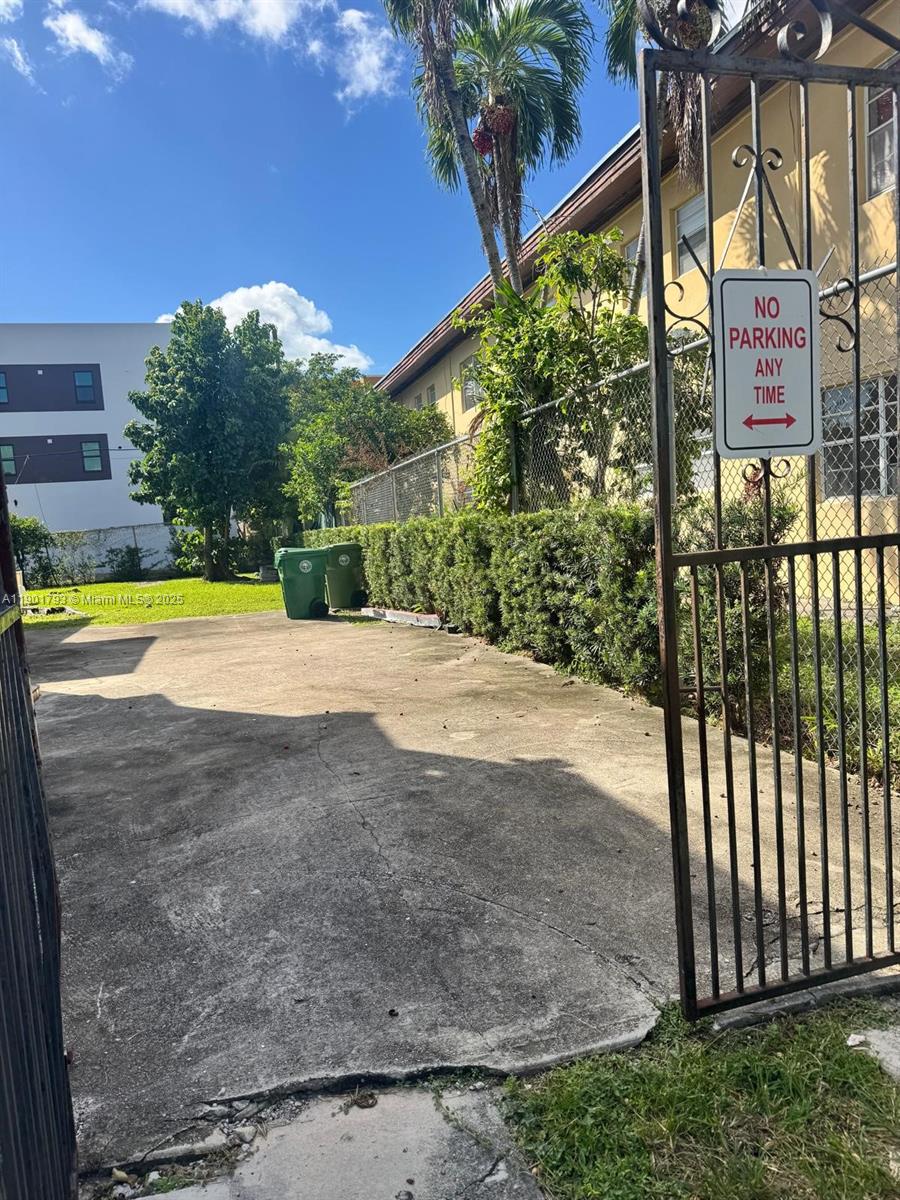 1036 Northwest 3rd Street, Unit 1 Miami, FL 33128 - Photo 5 of 22 a view of an outdoor space and yard