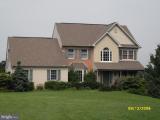 423 Evans Road Lititz, PA 17543 - Photo 1 of 1 a front view of a house with a garden