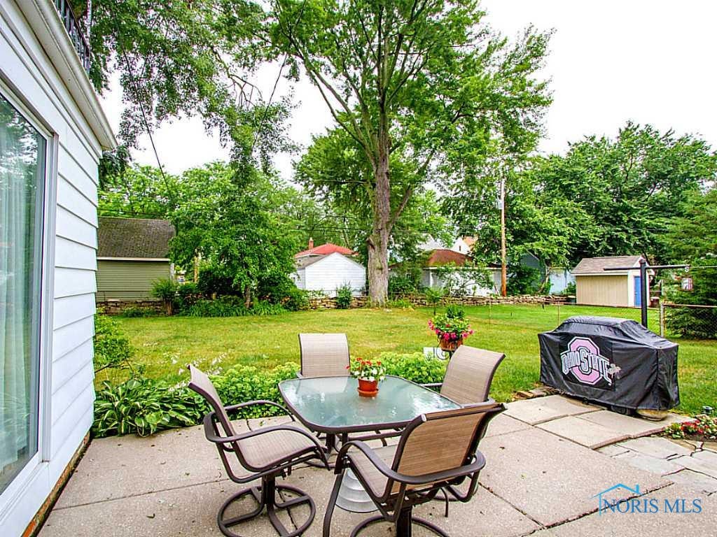3835 Elmhurst Road Toledo, OH 43613 - Photo 18 of 20 Exterior Back. Large patio - makes for perfect outdoor entertaining!