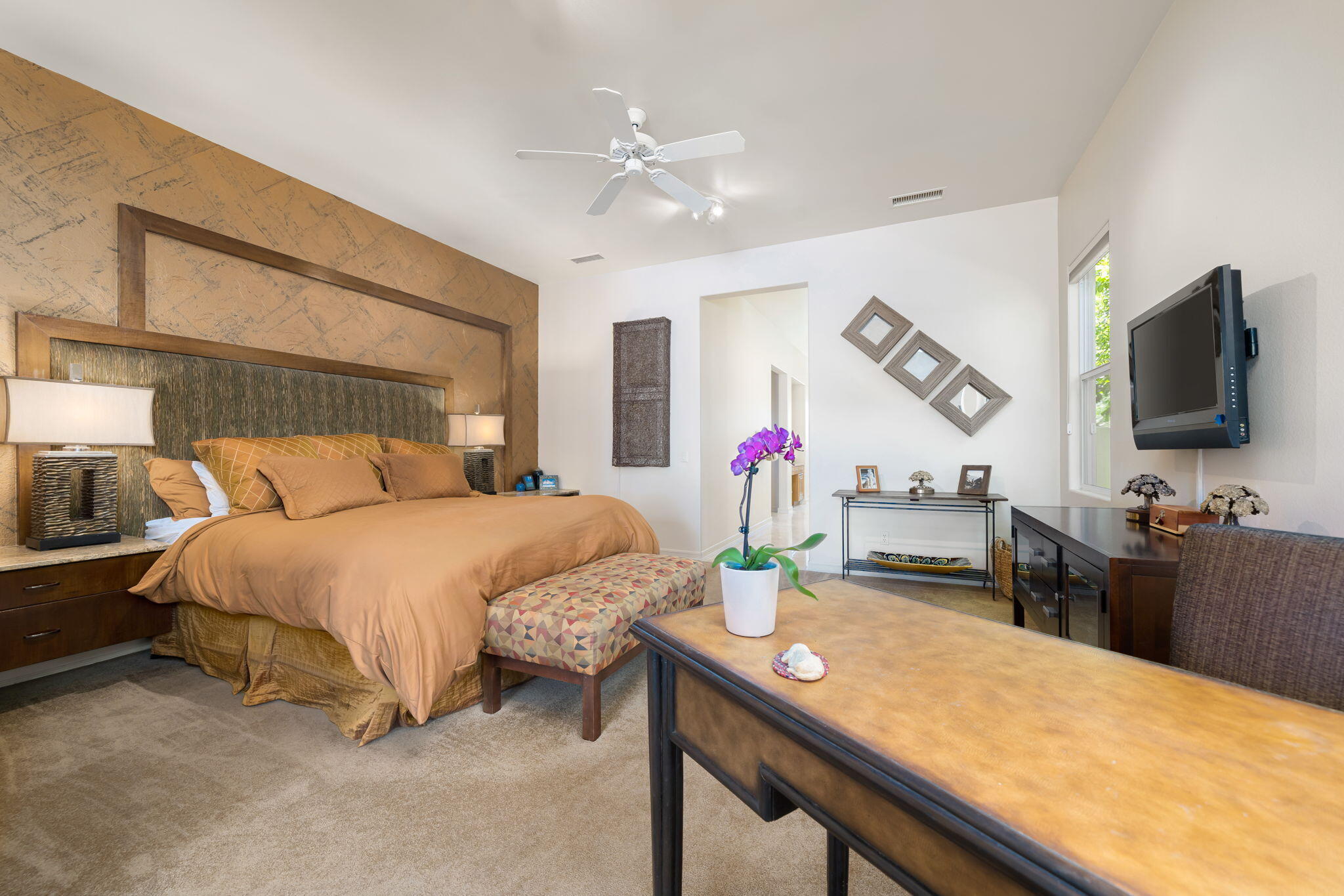 372 Loch Lomond Road Rancho Mirage, CA 92270 - Photo 26 of 51 a bedroom with a bed and a flat screen tv