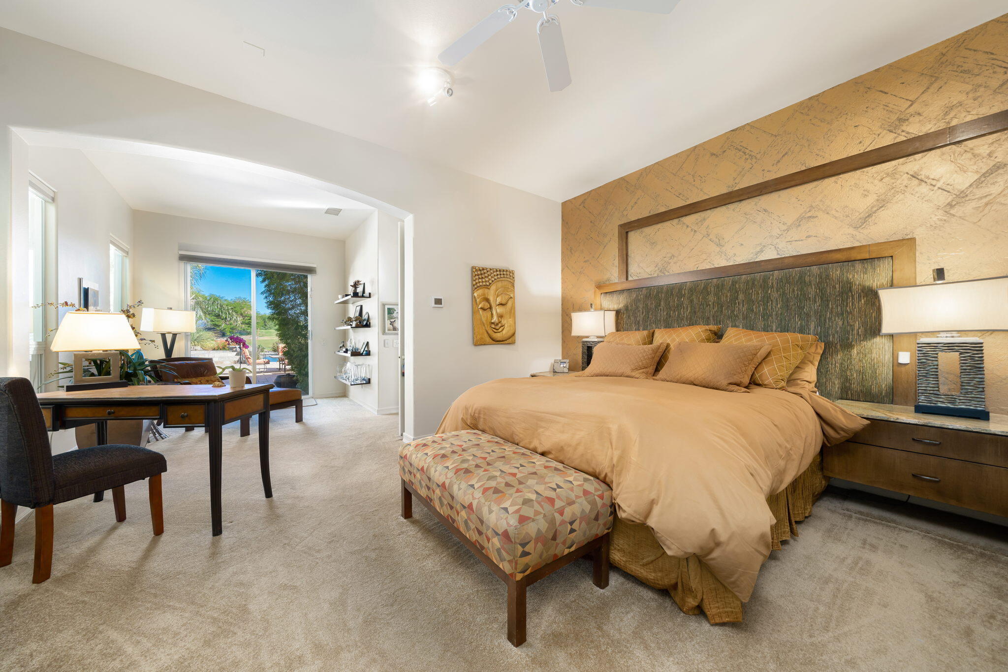 372 Loch Lomond Road Rancho Mirage, CA 92270 - Photo 27 of 51 a spacious bedroom with a bed and table