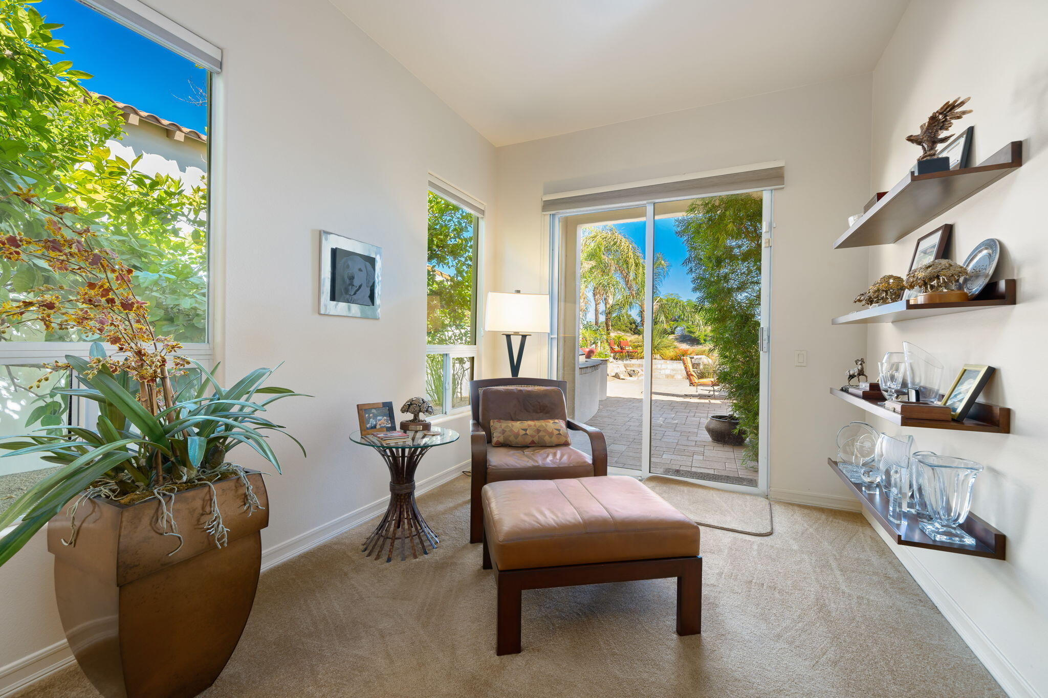 372 Loch Lomond Road Rancho Mirage, CA 92270 - Photo 28 of 51 a living room with furniture and a potted plant