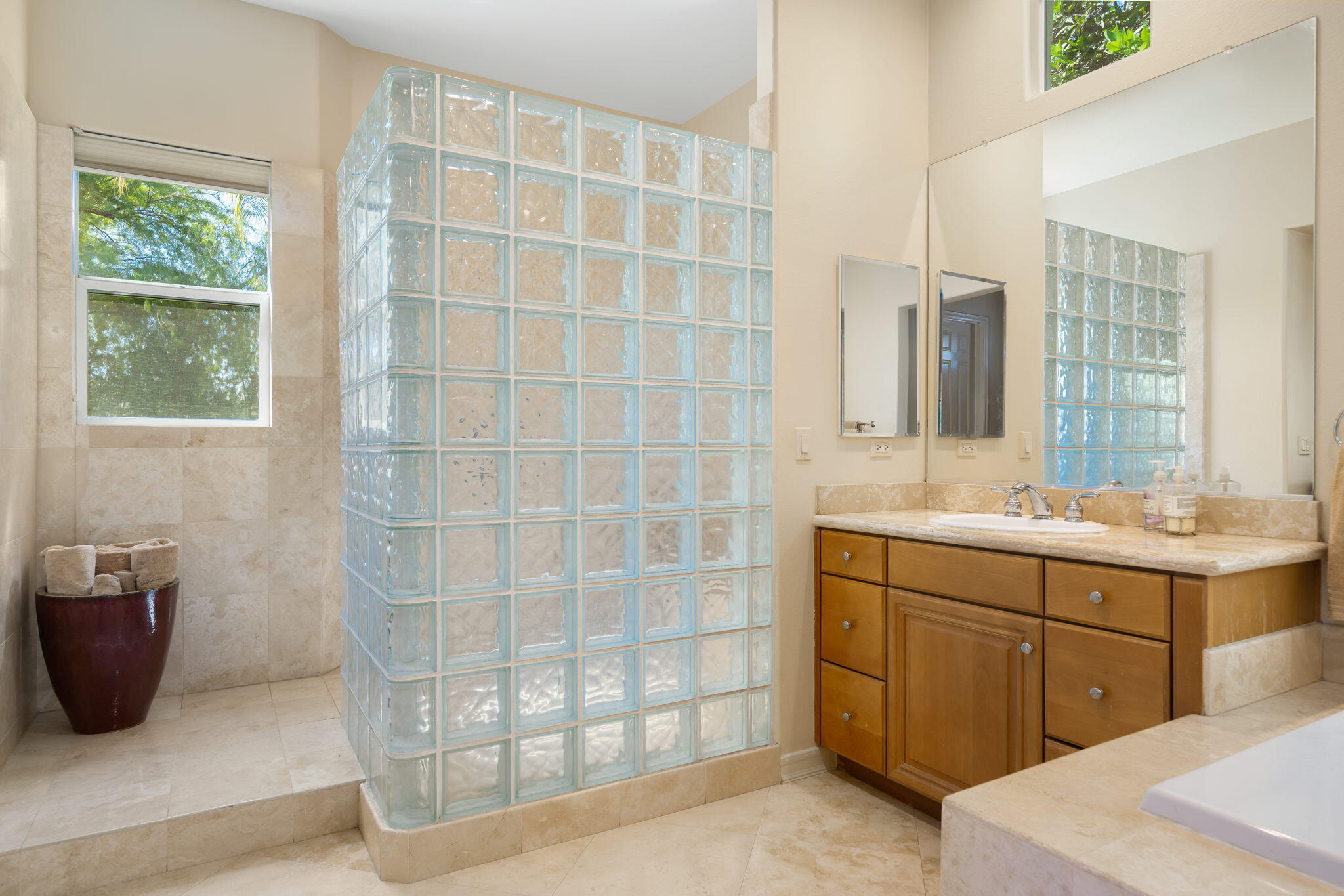372 Loch Lomond Road Rancho Mirage, CA 92270 - Photo 30 of 51 a bathroom with a double vanity sink a mirror and a shower