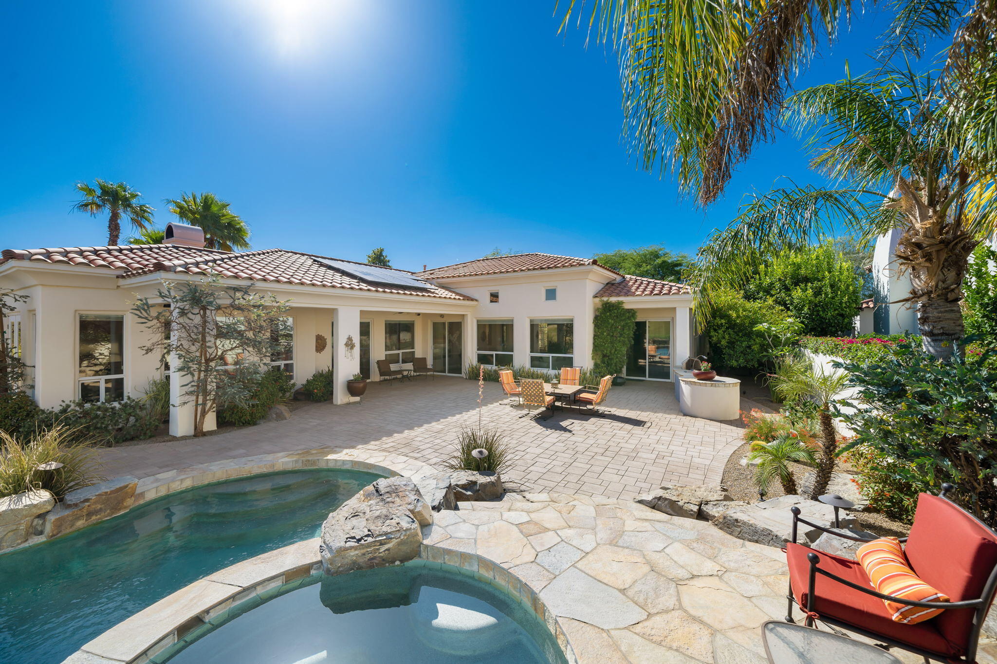 372 Loch Lomond Road Rancho Mirage, CA 92270 - Photo 34 of 51 a view of a house with backyard porch and sitting area