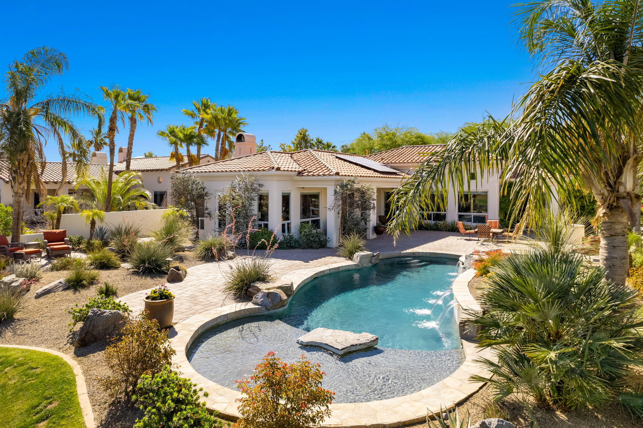 372 Loch Lomond Road Rancho Mirage, CA 92270 - Photo 44 of 51 a swimming pool with outdoor seating yard and barbeque oven