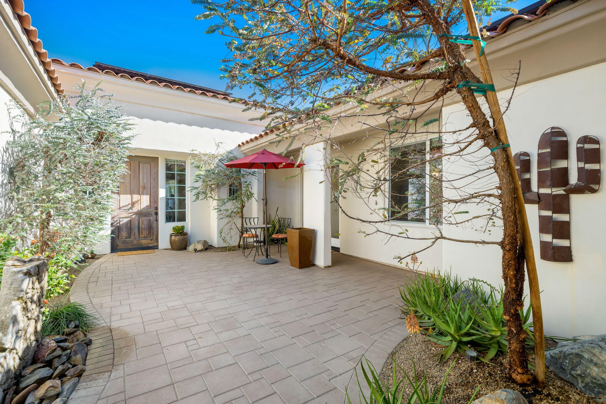 372 Loch Lomond Road Rancho Mirage, CA 92270 - Photo 6 of 51 a view of a house with a patio