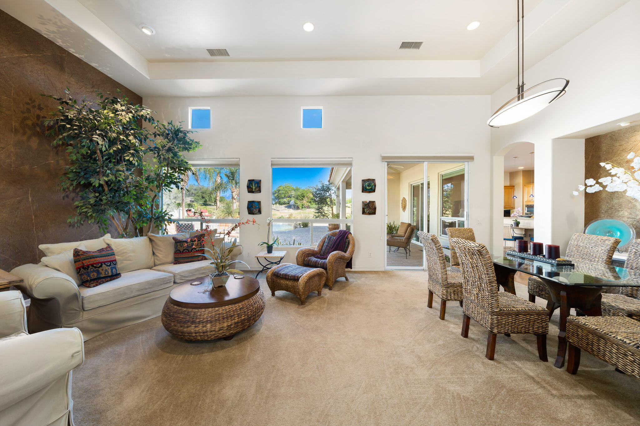 372 Loch Lomond Road Rancho Mirage, CA 92270 - Photo 8 of 51 a living room with furniture and a potted plant