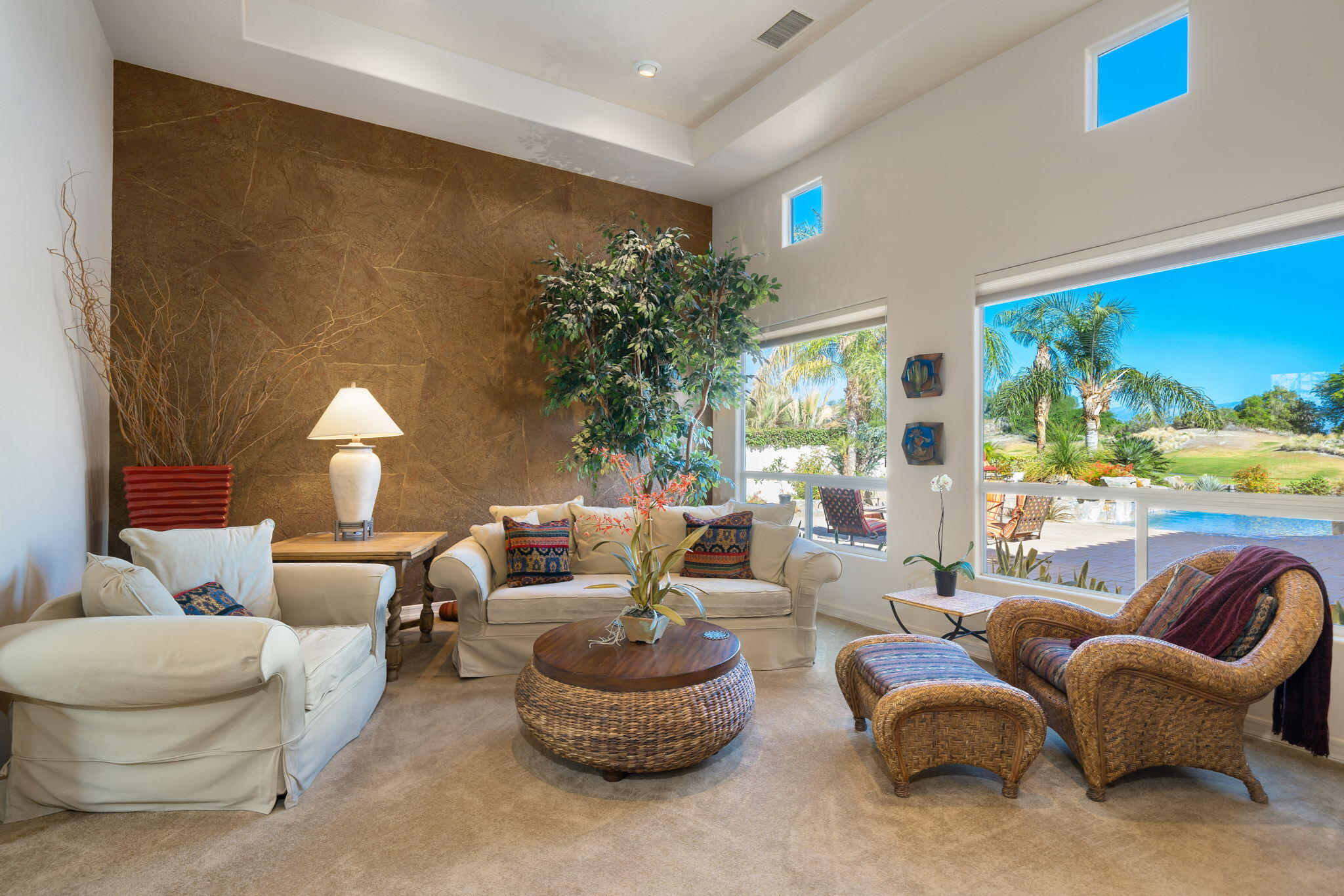 372 Loch Lomond Road Rancho Mirage, CA 92270 - Photo 9 of 51 a living room with furniture and a large window