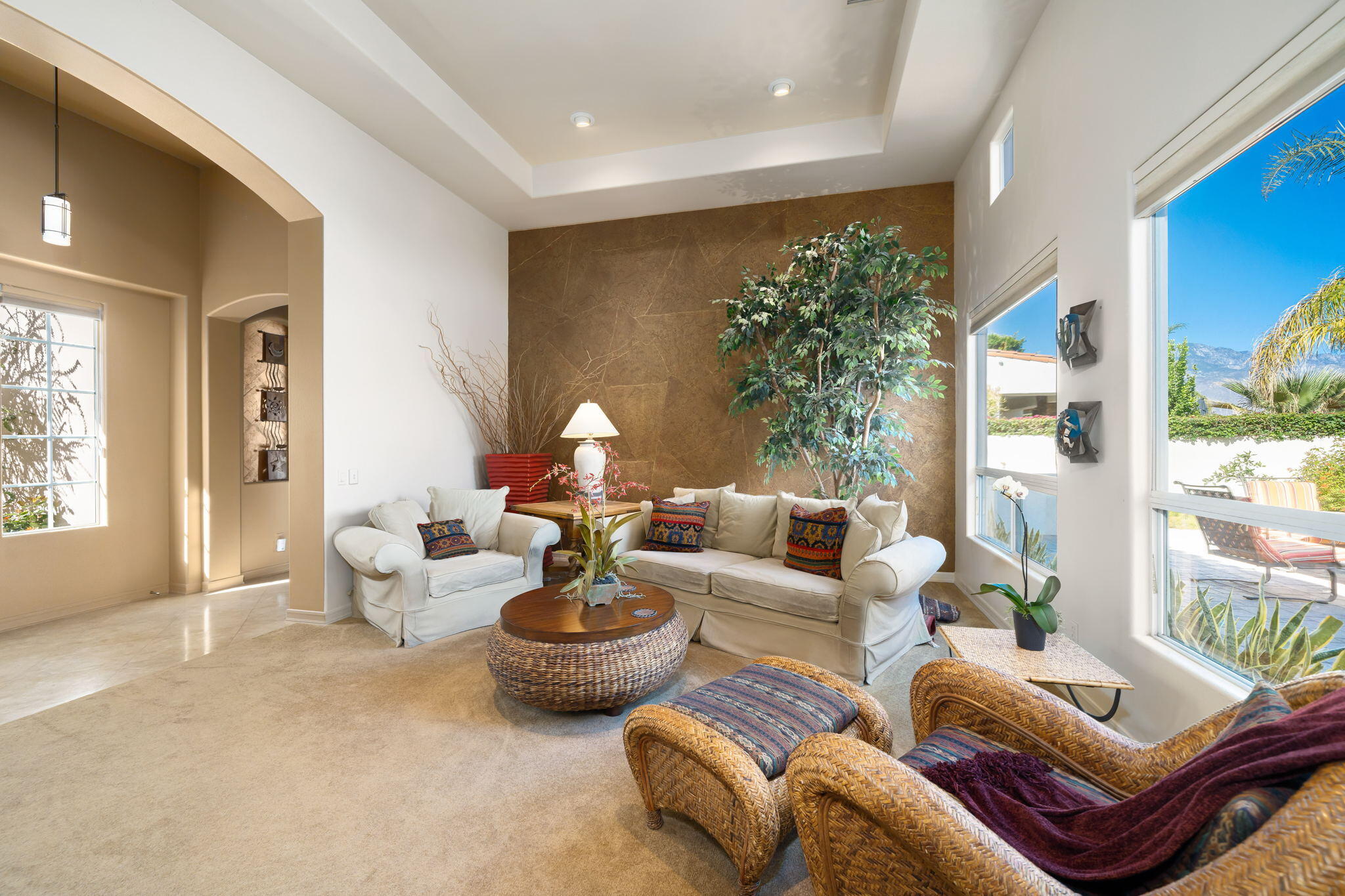 372 Loch Lomond Road Rancho Mirage, CA 92270 - Photo 10 of 51 a living room with furniture and a large window