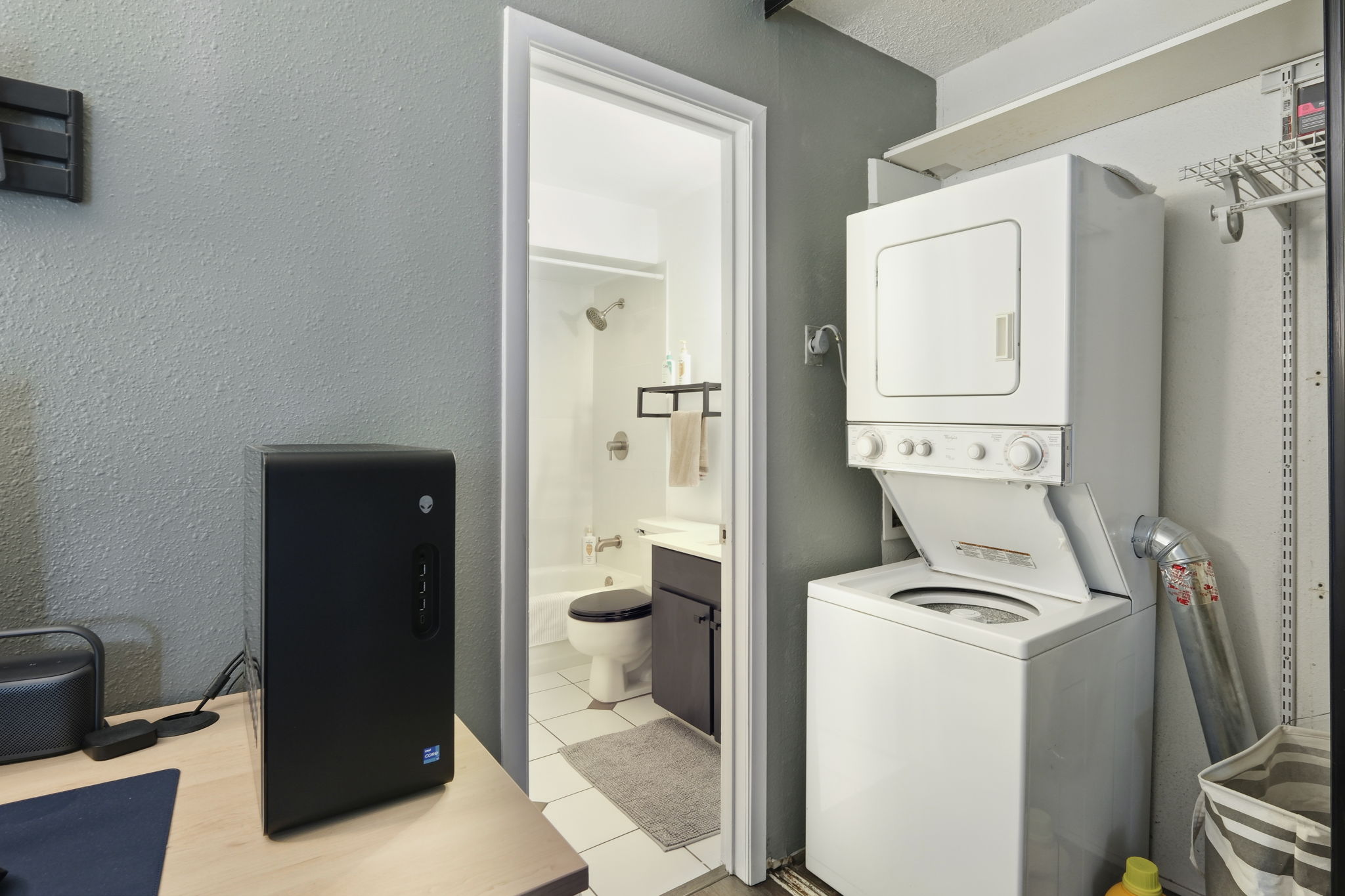 6910 Hart Lane, Unit 912 Austin, TX 78731 - Photo 23 of 36 Dedicated laundry area featuring a stacked washer and dryer