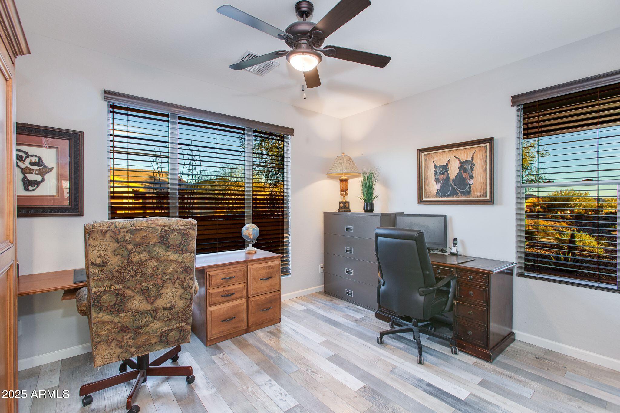 3800 Gold Ridge Road Wickenburg, AZ 85390 - Photo 18 of 51 a work room with furniture and windows