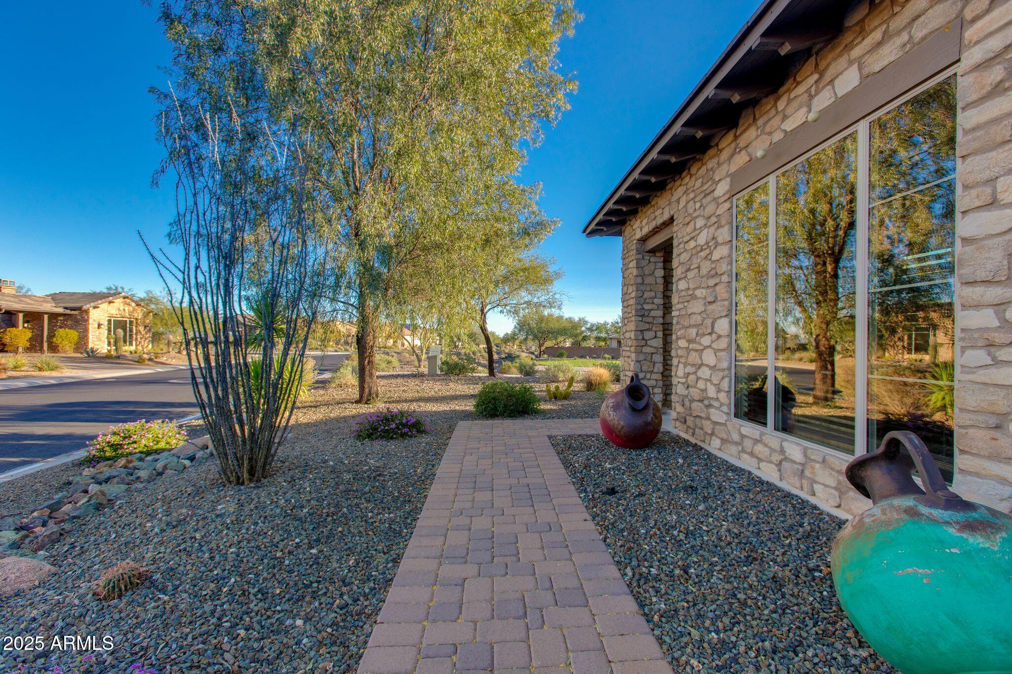 3800 Gold Ridge Road Wickenburg, AZ 85390 - Photo 2 of 51 a view of a garden with patio