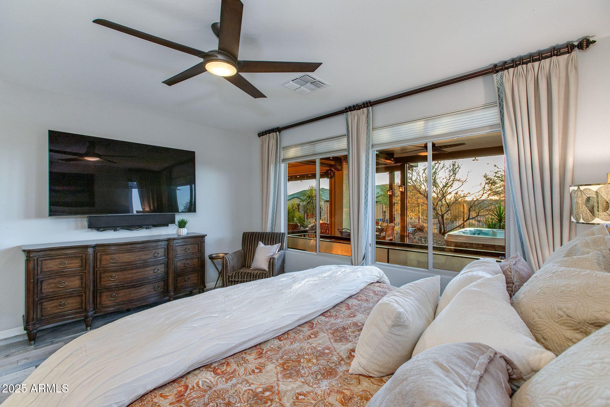 3800 Gold Ridge Road Wickenburg, AZ 85390 - Photo 23 of 51 a living room with furniture and a flat screen tv