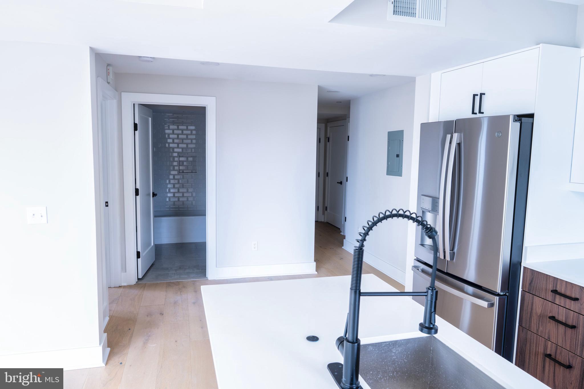 919 12th Street Northeast, Unit A301 Washington, DC 20002 - Photo 15 of 28 a view of a hallway with a elevator