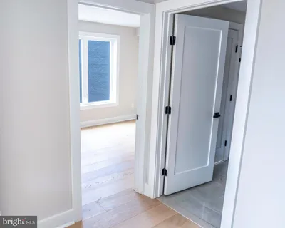a view of a bathroom from a empty room
