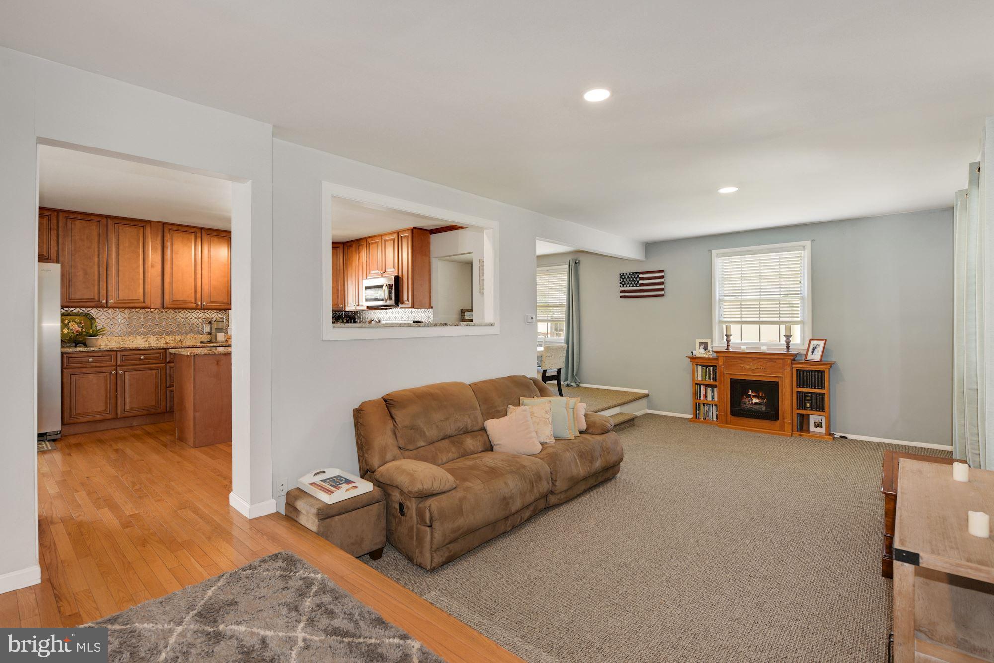 2403 Beverly Road Cinnaminson, NJ 08077 - Photo 8 of 24 a living room with furniture and a flat screen tv
