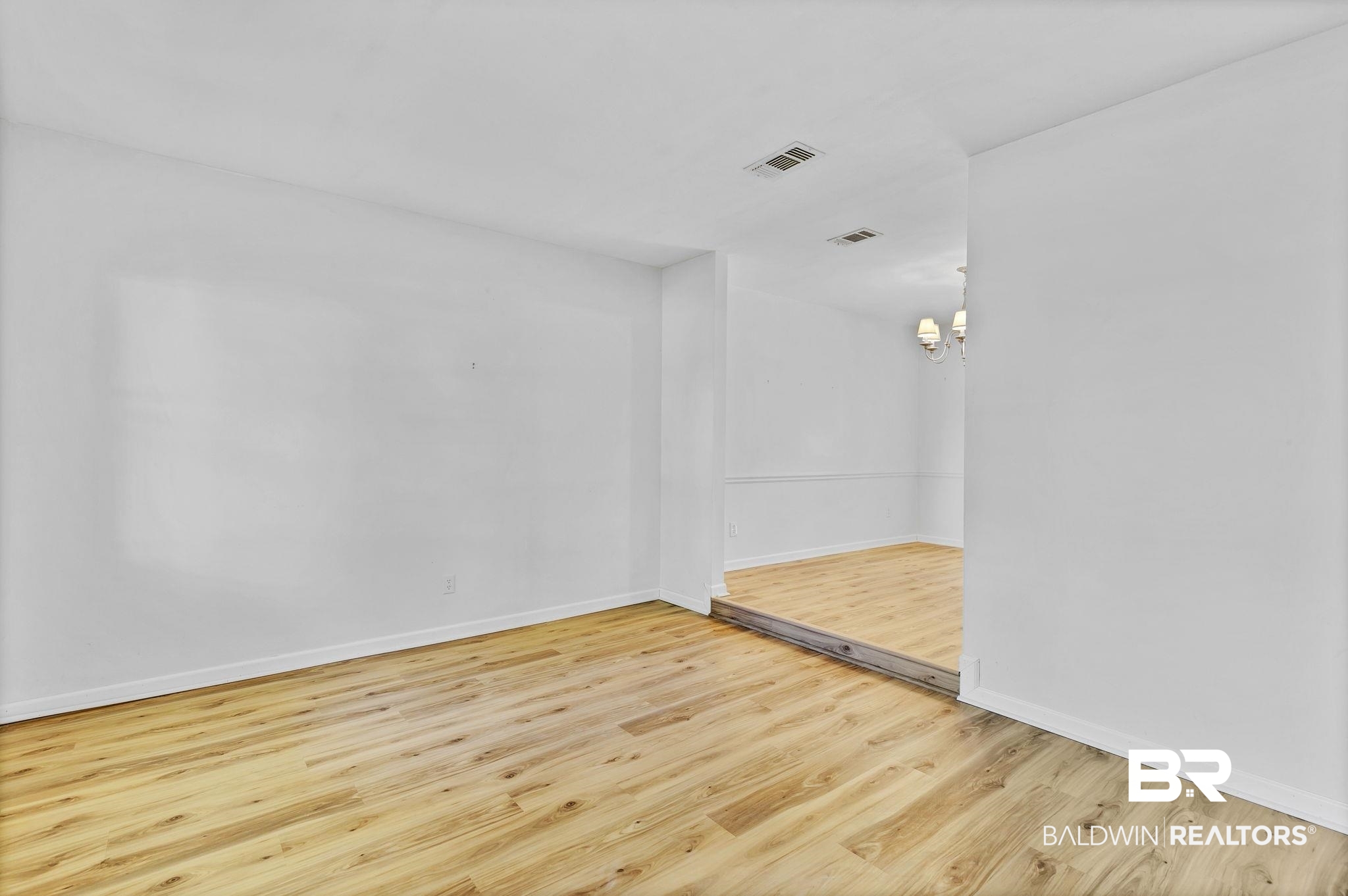 5817 Woodgate Road Mobile, AL 36609 - Photo 11 of 85 View of living room from the foyer. Living room is a step down.