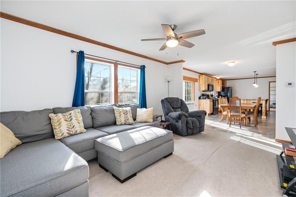 743 Slate Avenue Cranberry Township, PA 16066 - Photo 12 of 32 a living room with furniture and a large window