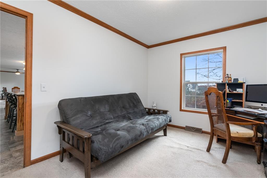743 Slate Avenue Cranberry Township, PA 16066 - Photo 14 of 32 a living room with furniture and a air conditioner vent