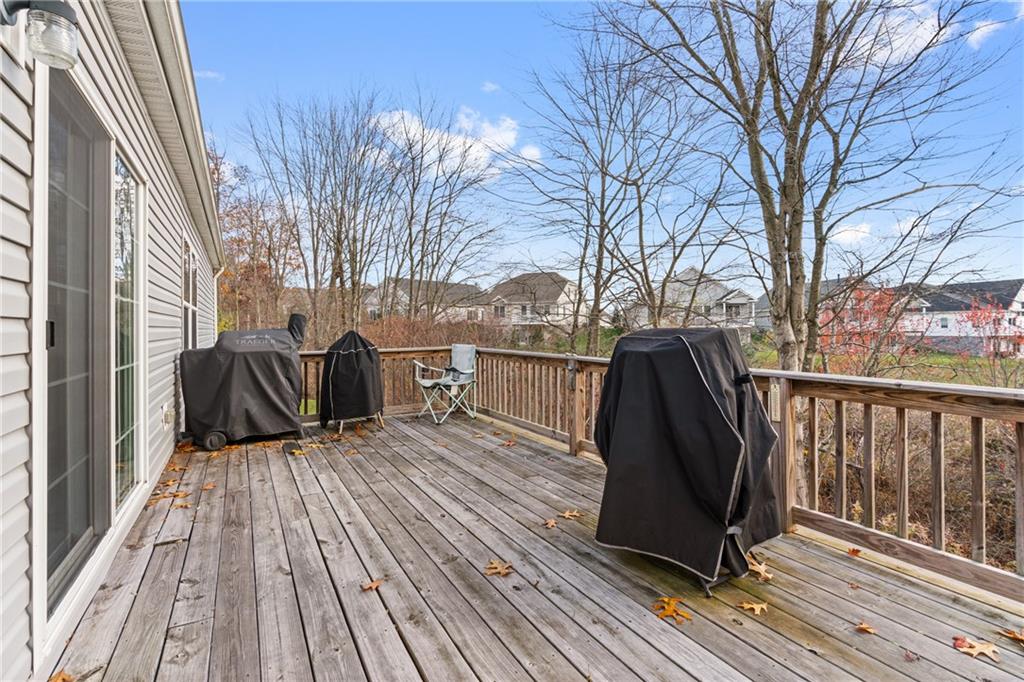 743 Slate Avenue Cranberry Township, PA 16066 - Photo 15 of 32 a view of roof deck with wooden floor and fence
