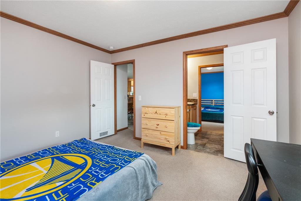 743 Slate Avenue Cranberry Township, PA 16066 - Photo 21 of 32 a bedroom with a bed and furniture