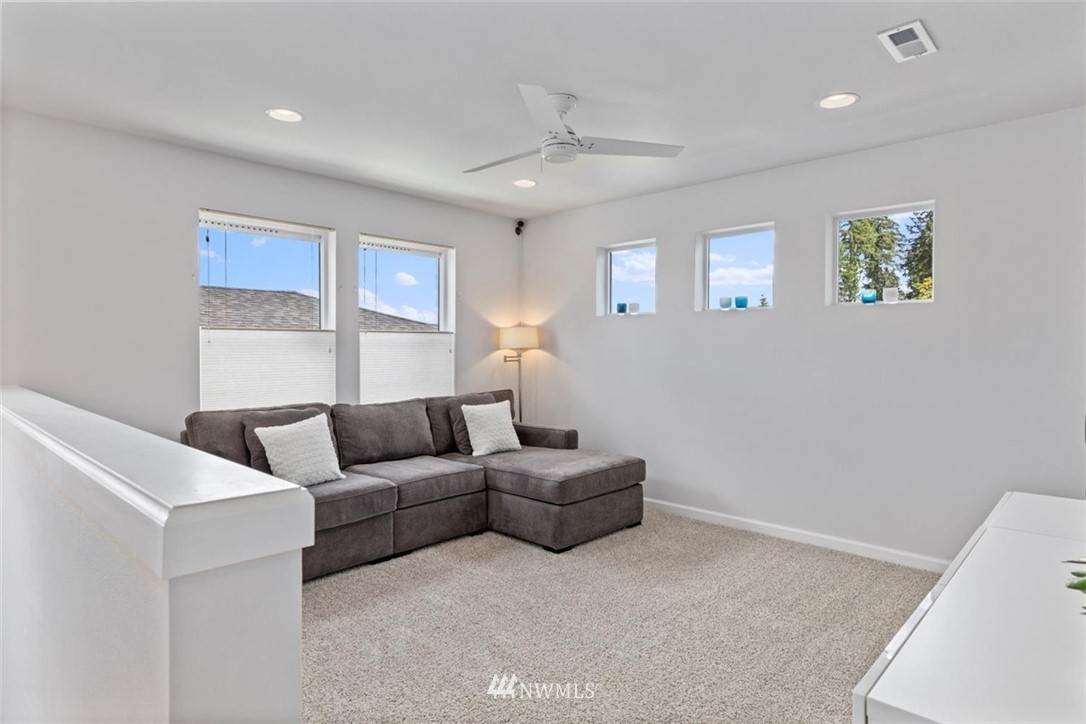 320 181st Street Southeast Bothell, WA 98012 - Photo 20 of 40 a living room with furniture and a window