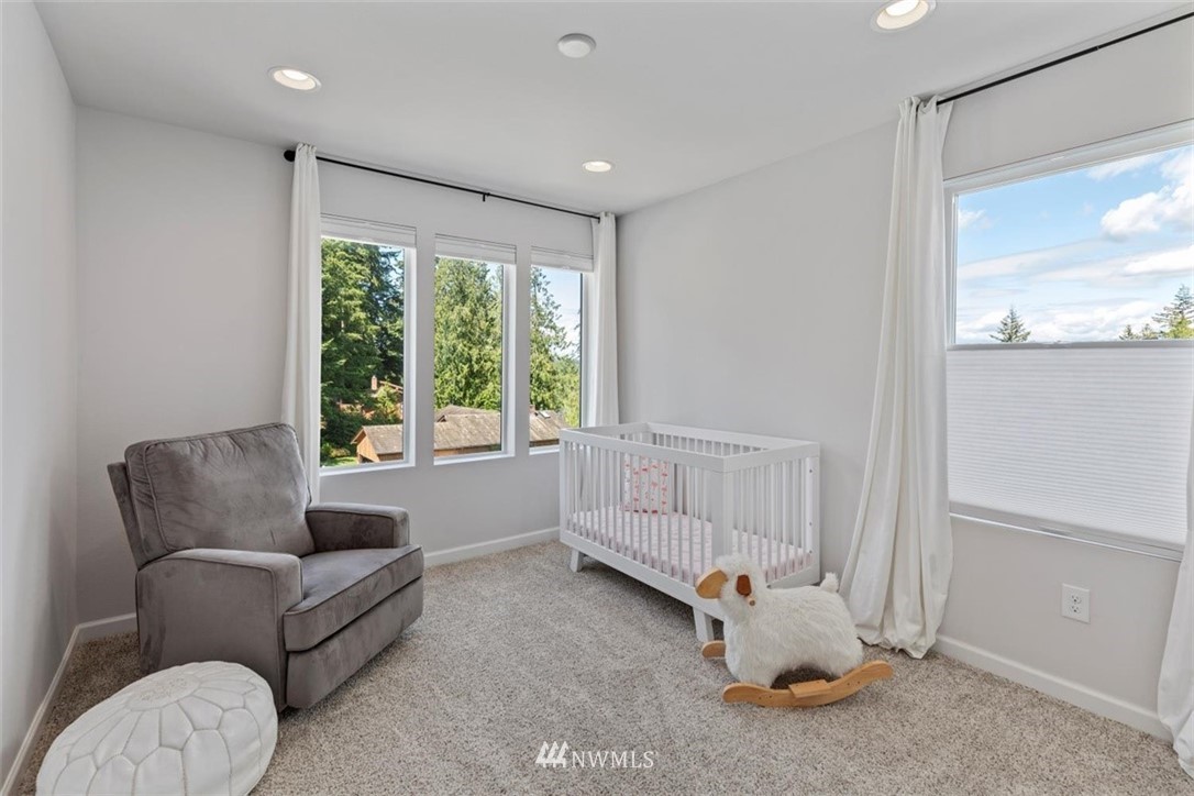 320 181st Street Southeast Bothell, WA 98012 - Photo 29 of 40 a living room with furniture and a window